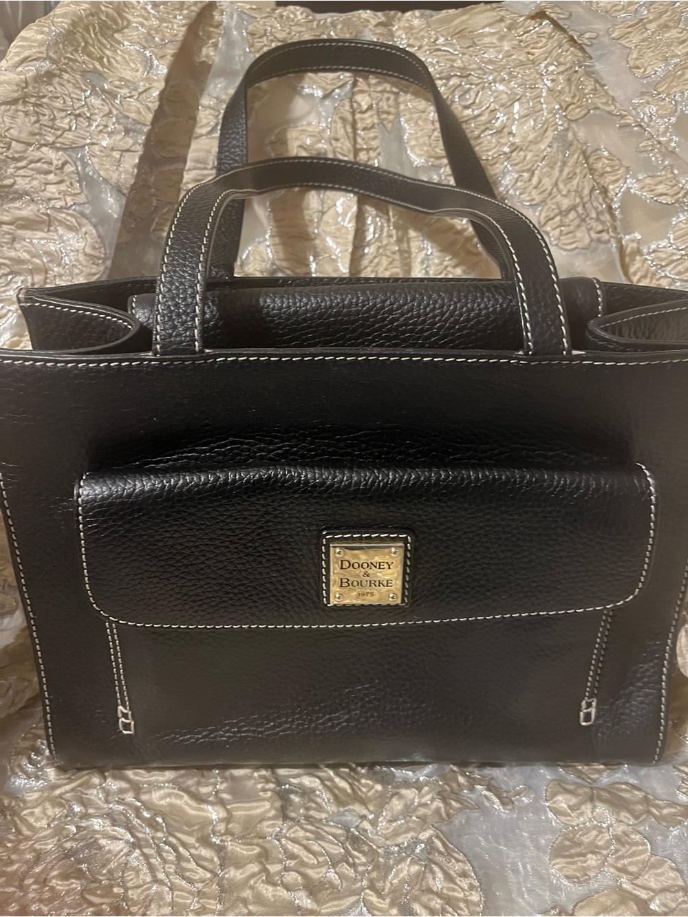 Dooney & Bourke Black Leather Tote with White Stitching and Gold Plaque